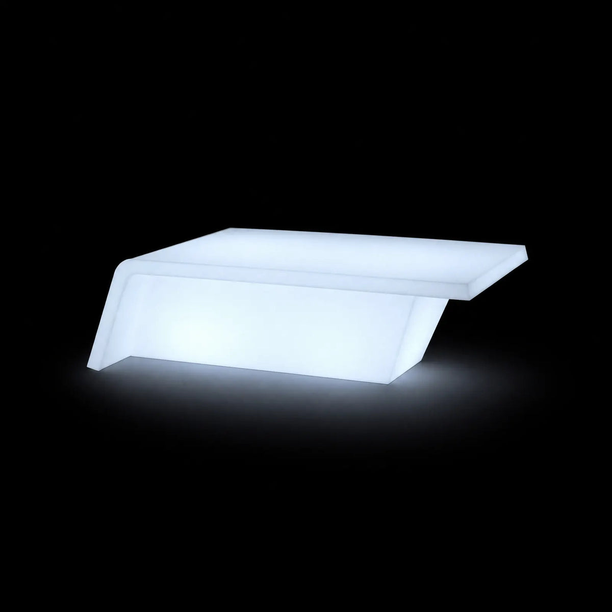 Table Basse - Rest LED Vondom, éclairé de l'intérieur sur fond noir