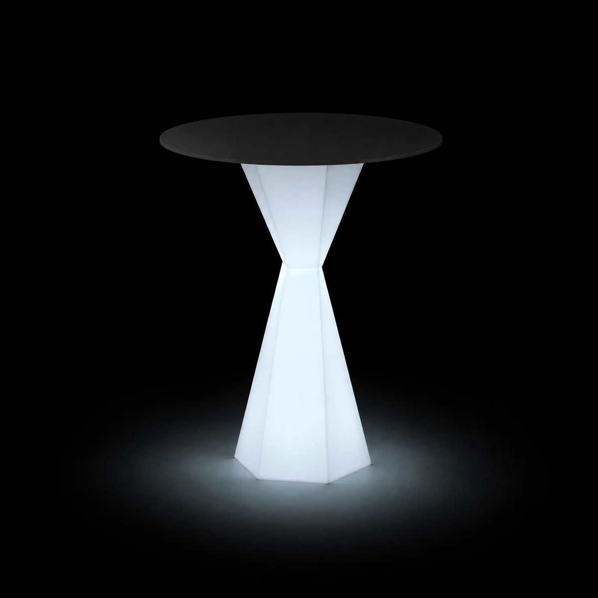 Table Vertex Ronde LED Vondom, éclairé de l'intérieur sur fond noir