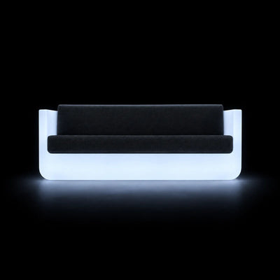 Canapé ULM LED Vondom, éclairé de l'intérieur sur fond noir