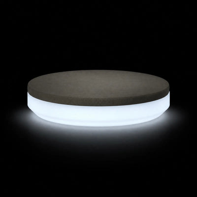 Daybed Vela Rond LED Vondom, éclairé de l'intérieur sur fond noir
