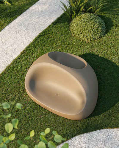 Fauteuil double Stone Vondom taupe vu de dessus dans un jardin