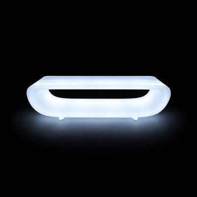 Table Basse Bum Bum LED Vondom, éclairé de l'intérieur sur fond noir