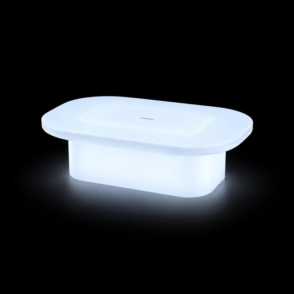 Table Basse Luna LED Vondom, éclairé de l'intérieur sur fond noir