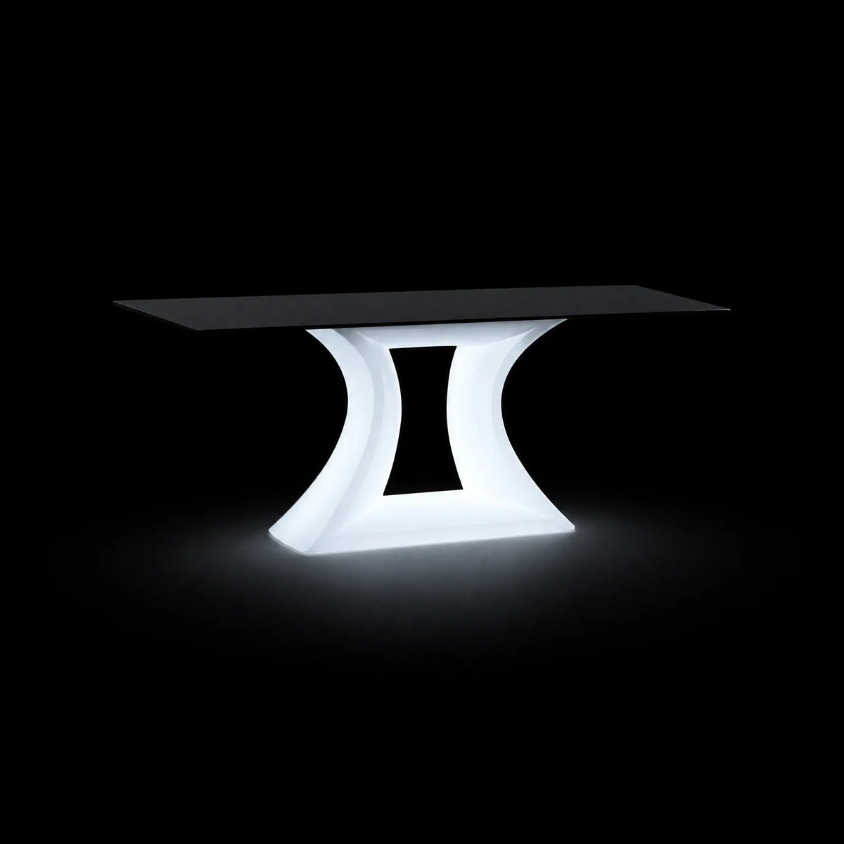 Table de Jardin Rest LED Vondom, éclairé de l'intérieur sur fond noir, taille 200x100x76 cm