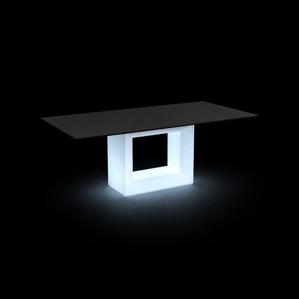 Table de Jardin Vela LED Vondom, éclairé de l'intérieur sur fond noir, taille 200x100x72 cm