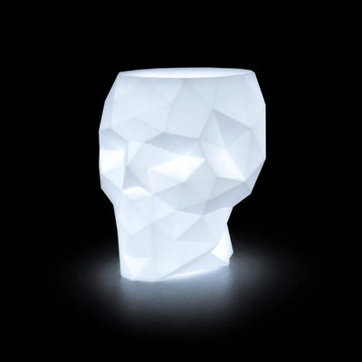 Table - Skull LED Vondom, éclairé de l'intérieur sur fond noir